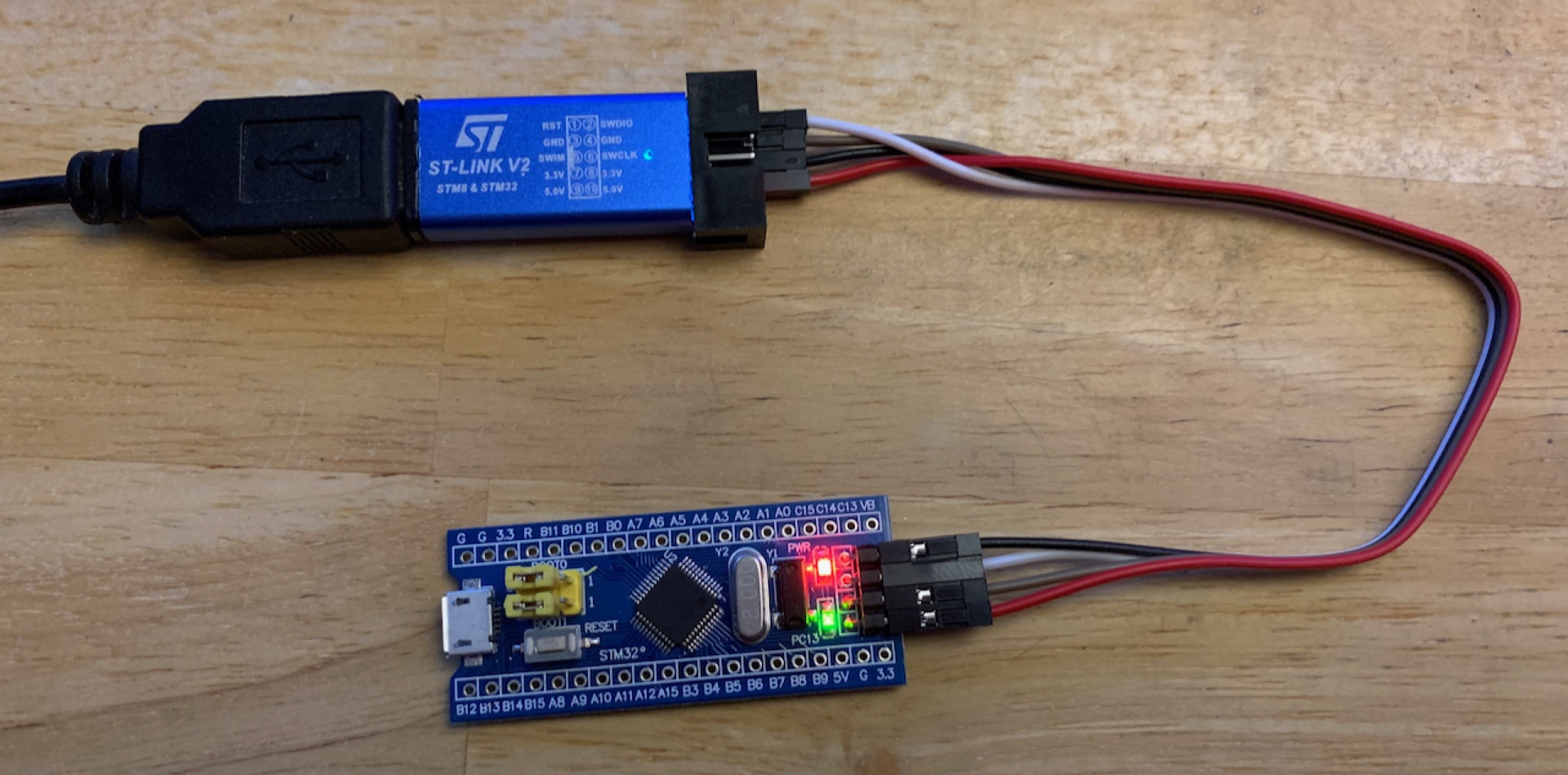 Figure 1: ST-Link/v2 knock-off connected to a &lsquo;Blue Pill&rsquo; development board